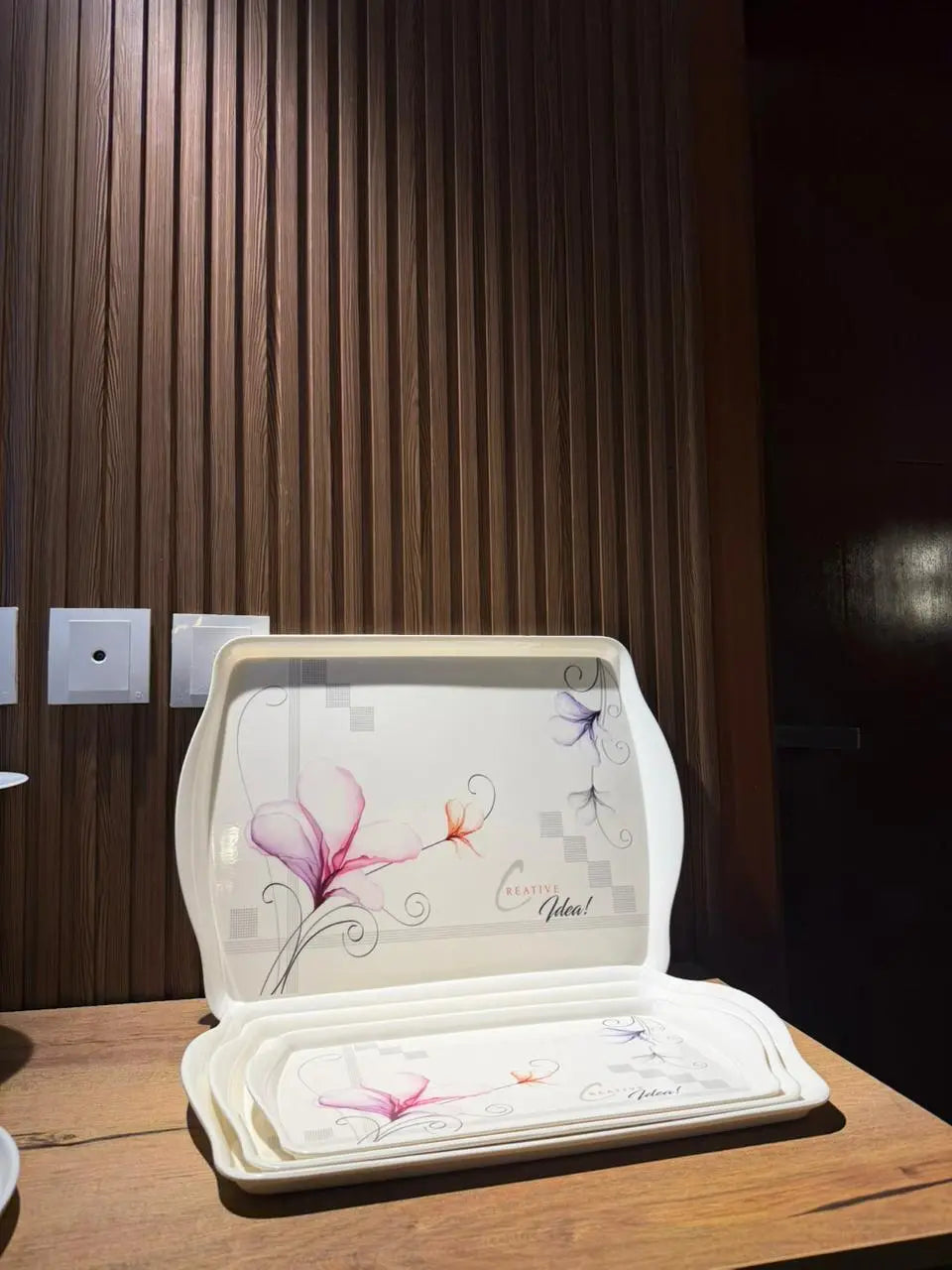 Takalluf 4-piece floral melamine serving trays in individual graduating sizes