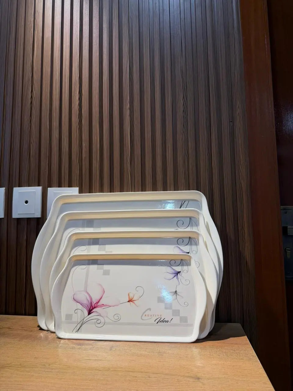 Takalluf floral melamine nesting tray set, close-up of pink and purple floral pattern