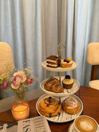 Takalluf 3-tier printed melamine serving stand styled with desserts