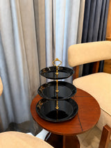 Takalluf 3-tier black melamine dessert stand with gold accents