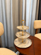 Takalluf 3-tier printed melamine stand, close-up of marble and gold pattern