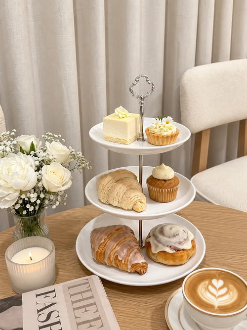Takalluf 3-tier white melamine stand lifestyle photo with silver hardware